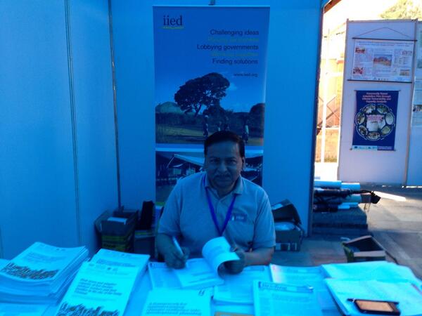 Book signing on the IIED stand! @SaleemulHuq & Hannah Reid book: Community-based adaptation to climate change #CBA8 http://t.co/a1rgOpW5mr