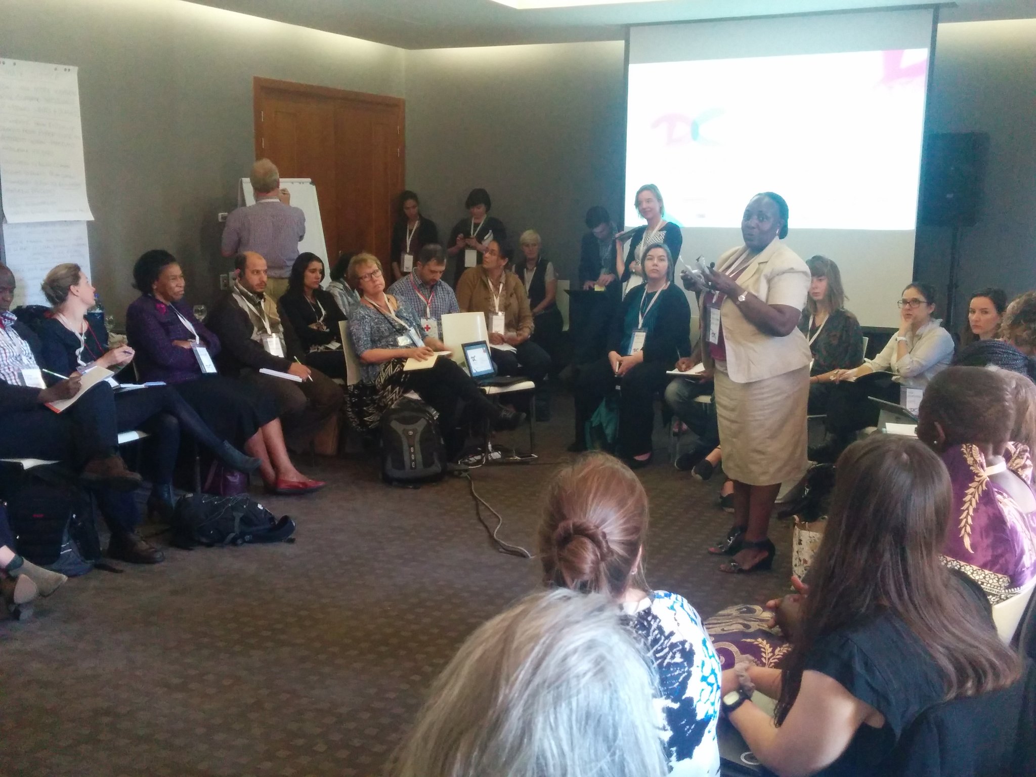 A packed room at #DCdays listens to @TKajumba discuss her experience in Uganda of how to integrate local voices at national levels https://t.co/tms8xcuD4W